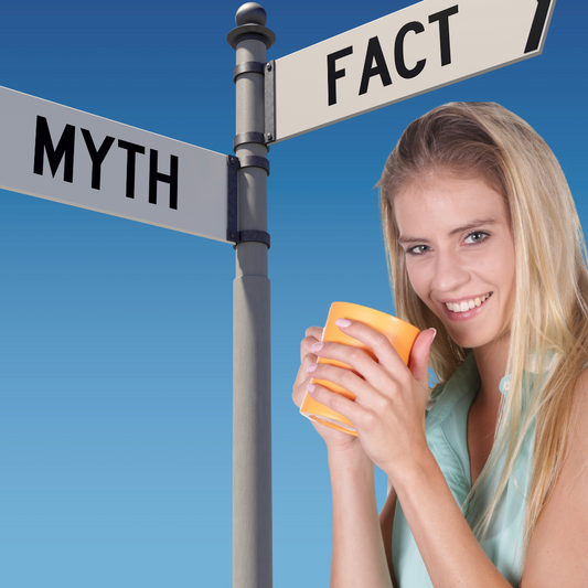 healthy lady drinking tea with a sign in the background pointing to myth one way and fact the other