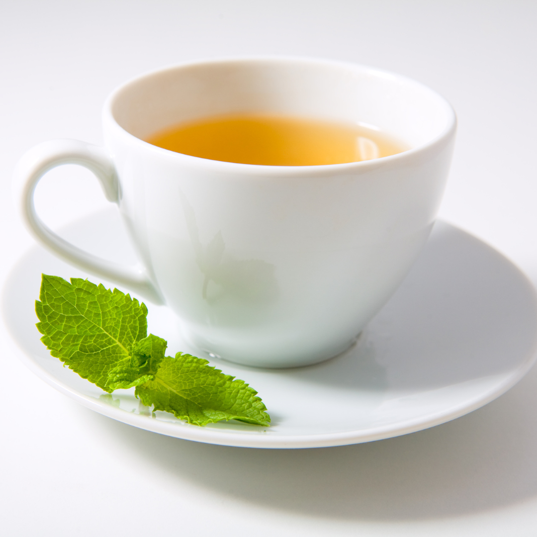 Peppermint tea in a white cup