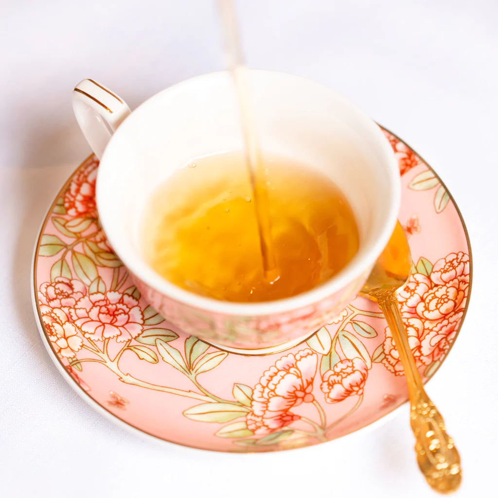 Pretty pink bone china Cristina Re butterfly cup and saucer.  